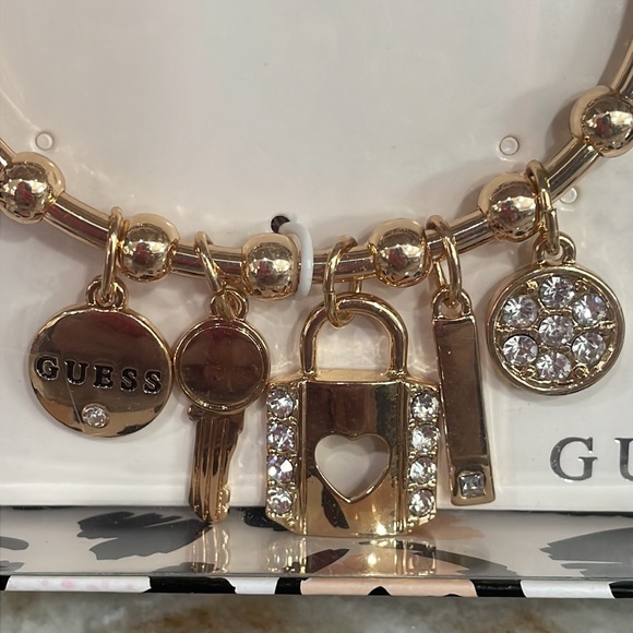 BNIB Guess Logo Rhinestone Lock & Key Charm Bracelet Earring Set Gold Tone 3 pc - Picture 3 of 8